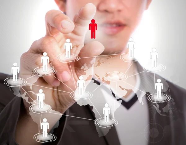 Young business man point to social network and world map — Stock Photo, Image