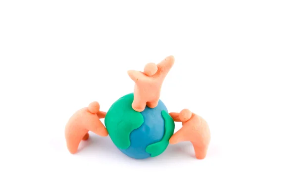 Plasticine of embracing the earth — Stock Photo, Image