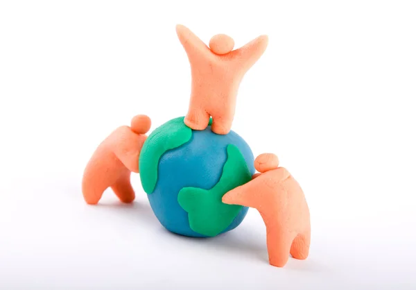 Plasticine of embracing the earth — Stock Photo, Image