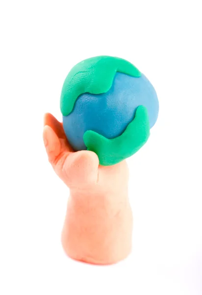 Plasticine of hand holding the Earth — Stock Photo, Image