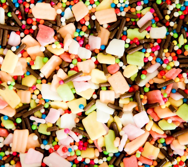 Espolvoreos coloridos para la decoración de la torta o la cobertura de helado — Foto de Stock