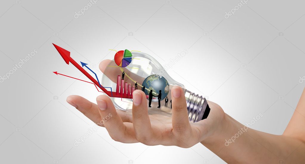 Light bulb in hand with graph out