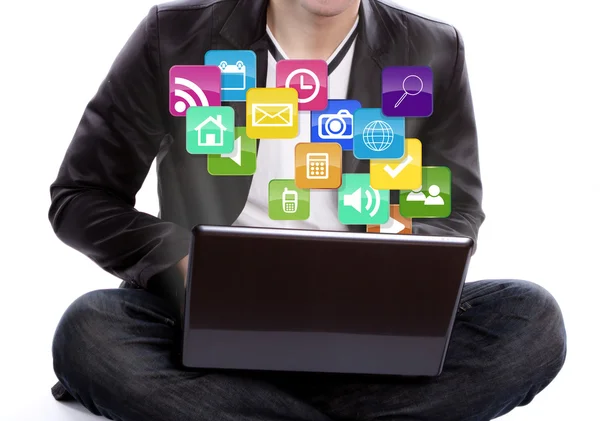 Business man with laptop and colorful application icons — Stock Photo, Image