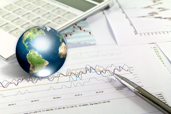 Pen and business graph with earth (Elements of this image furnis Stock Picture