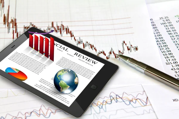 Touch pad and financial Graphs (Elements of this image furnished — Stock Photo, Image