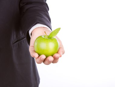 elinde bir yeşil elma ile işadamı el beyaz izole