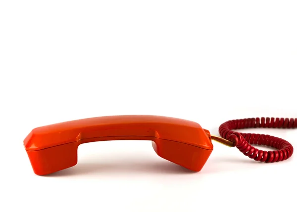 Teléfono rojo antiguo aislado sobre fondo blanco — Foto de Stock