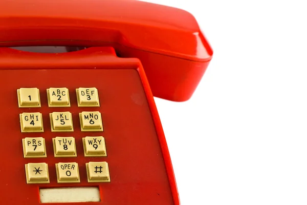 Beyaz arka plan üzerinde izole eski kırmızı telefon — Stok fotoğraf