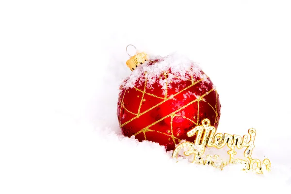 Gold christmas balls with snow — Stock Photo, Image