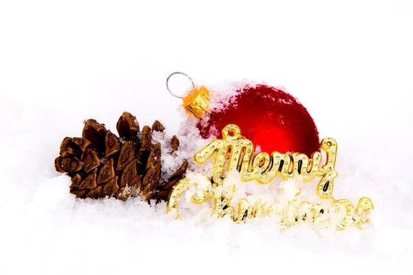 Золоті різдвяні кульки зі снігом — стокове фото
