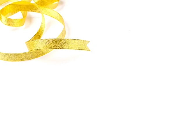 Gold ribbon with bow on white background — Stock Photo, Image