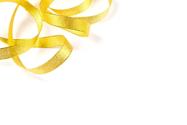 Ruban en or avec noeud sur fond blanc — Photo