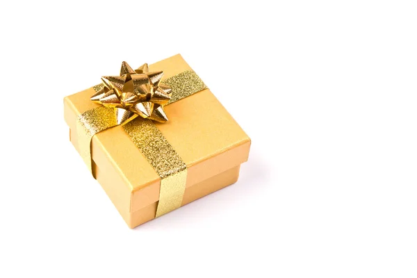 Caja de regalo de oro con cinta dorada —  Fotos de Stock