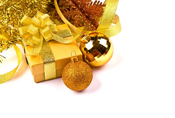 Golden gift box with golden ribbon — Stock Photo, Image