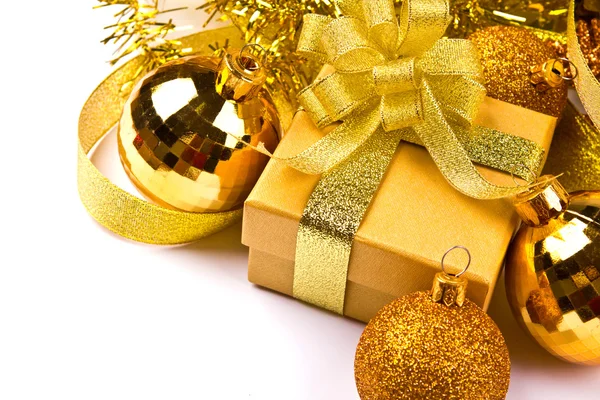 Golden gift box with golden ribbon — Stock Photo, Image