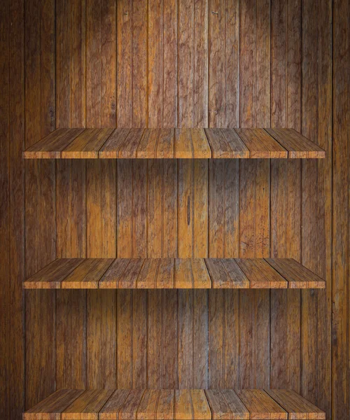 Leeres Bücherregal an der Wand — Stockfoto