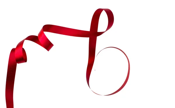 Shiny red ribbon on white background with copy space. — Stock Photo, Image