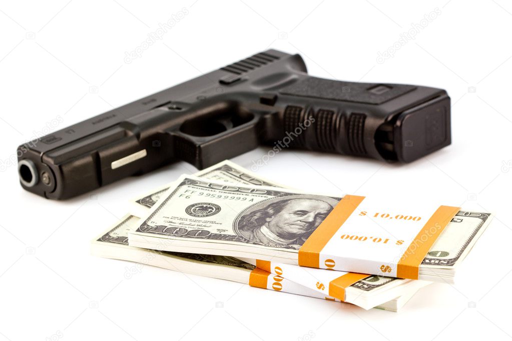 Close up image of pistol and dollar