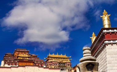 Photo of Ganden Sumtseling Monastery in Yunnan Province China clipart