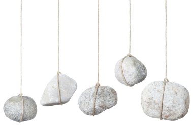 Stone, rock hanging by a string clipart