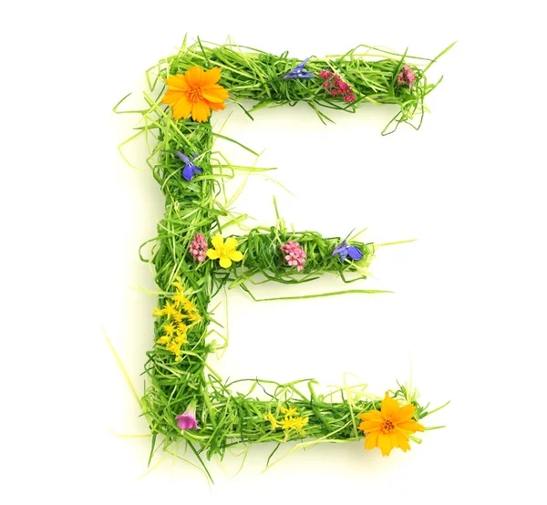 Letters made of flowers and grass — Stock Photo, Image