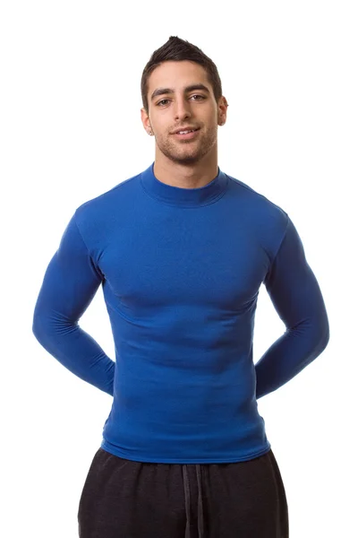 Uomo atletico in camicia blu compressione. Studio girato sopra bianco . — Foto Stock