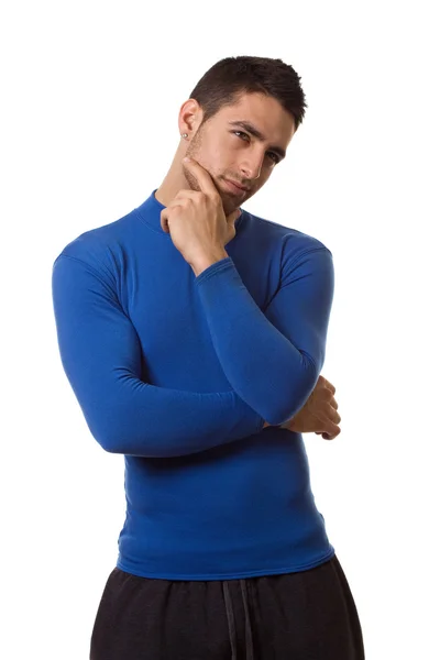 Lekkoatletycznego mężczyzna w koszuli niebieski kompresji. łapka na biały. — Zdjęcie stockowe