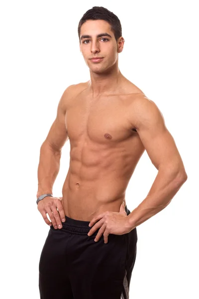 Atletische man, shirtless. studio opname over Wit. — Stockfoto