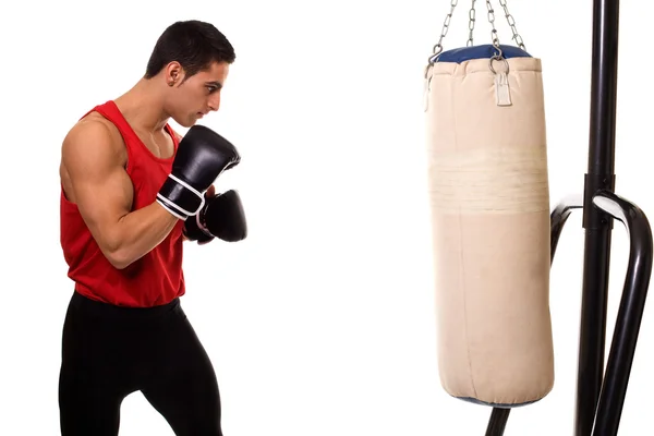 Боксерські тренування з важкою сумкою. Студійний знімок над білим . — стокове фото