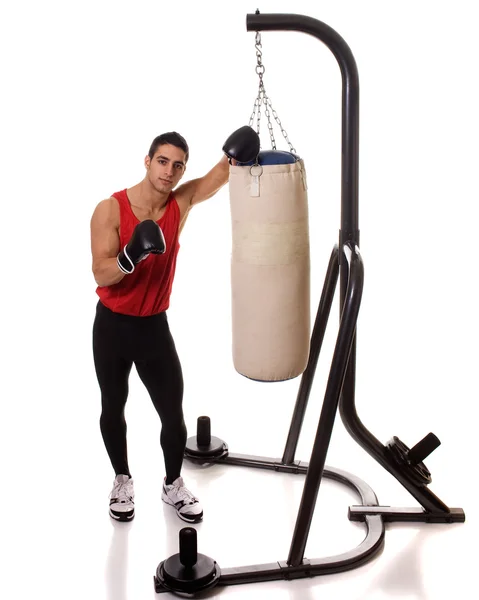 体育锻炼拳击与沉重的包。射过白色的工作室. — 图库照片