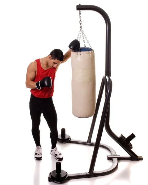 Exercício de boxe com saco pesado. Estúdio tiro sobre branco . — Fotografia de Stock