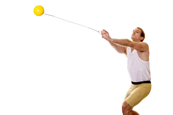 Track and field athlete competing hammer throw. Studio shot over white. — Stock Photo, Image