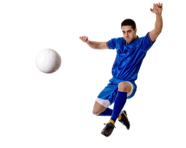 サッカー選手を蹴るします。白にわたって撮影スタジオ. — ストック写真