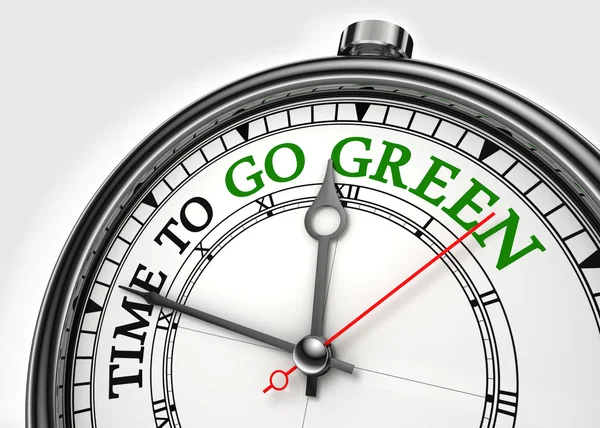 stock image Time to go green concept clock