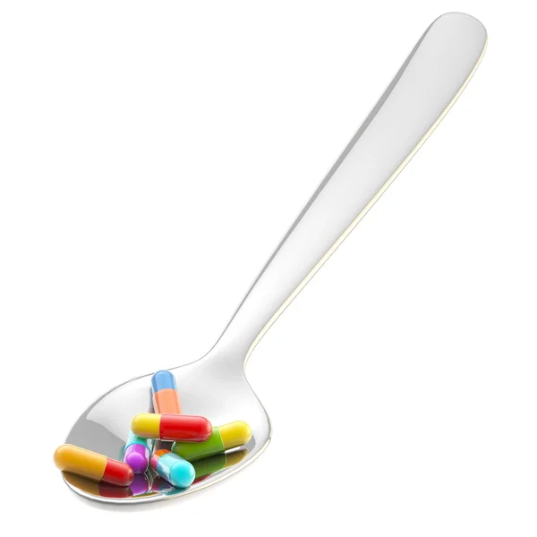 Cucchiaio di metallo con una porzione di medicinale isolata — Foto Stock