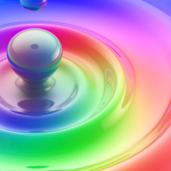 Rainbow colored liquid paint drop with waves — Stock Photo, Image