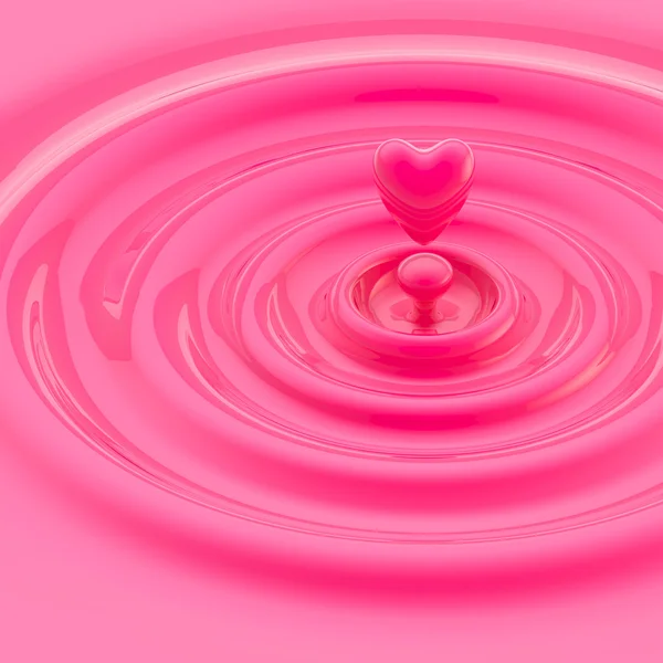 Queda de líquido em forma de coração em ondas — Fotografia de Stock