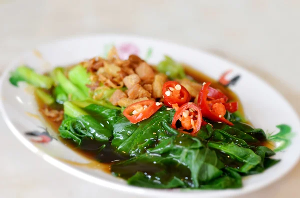 Stir fried chinese kale with oyster sauce — Stock Photo, Image
