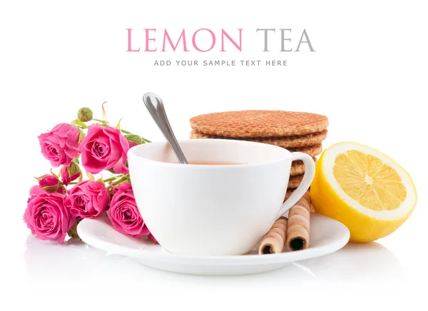 Tea in cup with biscuits and lemon — Stock Photo, Image