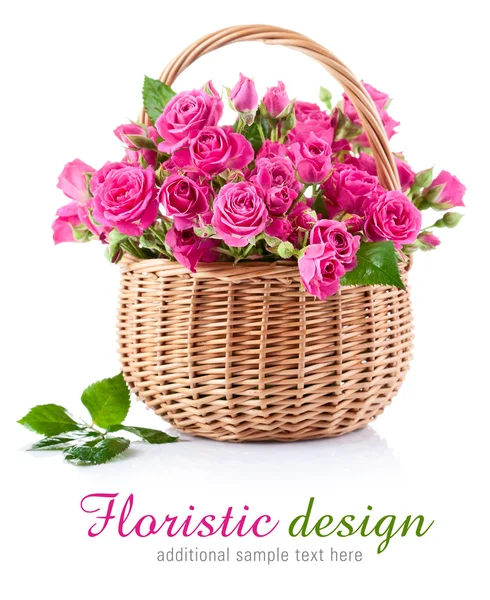 Bouquet of pink roses in basket — Stock Photo, Image