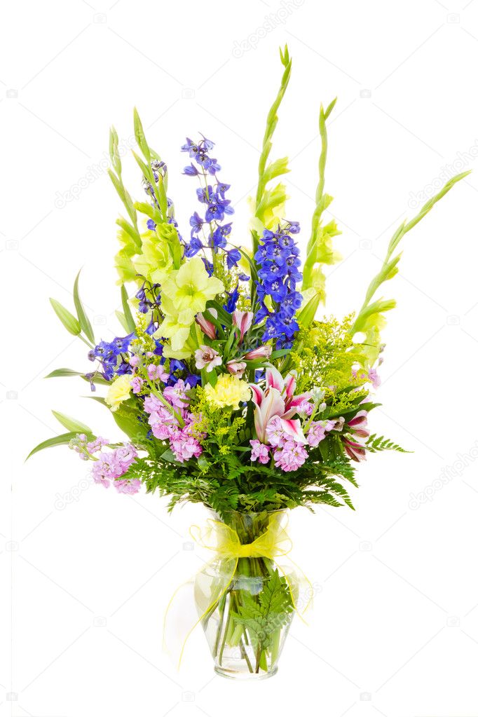 Large colorful flower arrangement with gladiolus, lilly, carnation, rose, delphinium isolated on white