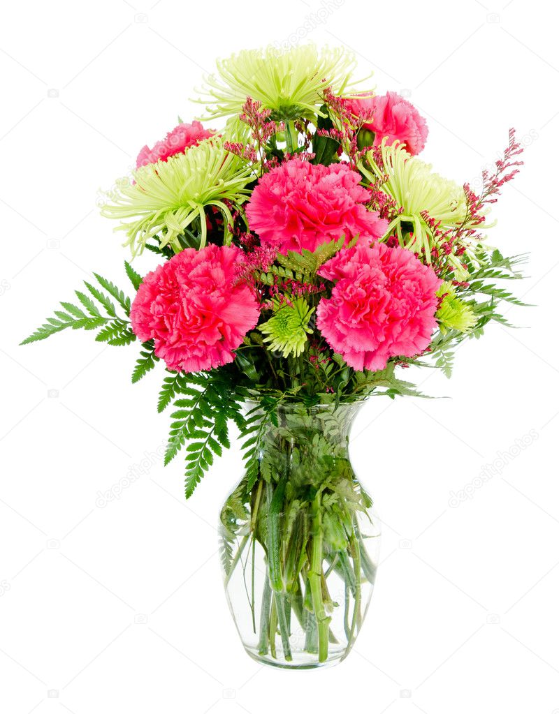 Colorful pink and green flower arrangement with carnations and spider mums isolated on white
