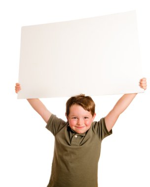 Portrait of young child boy holding blank sign with room for your copy isolated on white clipart