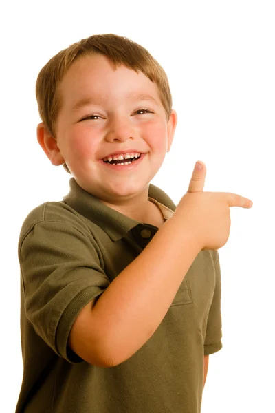 Πορτρέτο του παιδιού νεαρό αγόρι που δείχνει μια κατεύθυνση που απομονώνονται σε λευκό — Φωτογραφία Αρχείου