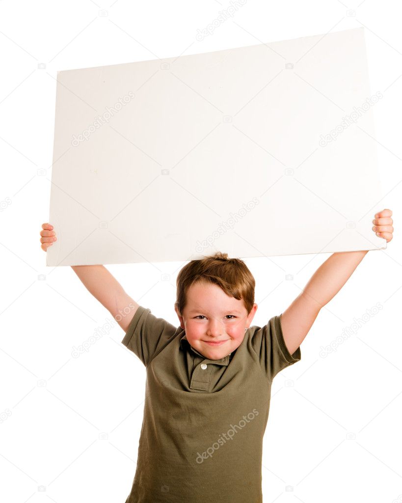 Portrait of young child boy holding blank sign with room for your copy isolated on white