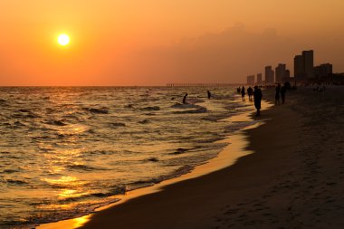 Shoreline of Panama City Beach at sunset clipart