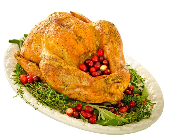 Roasted turkey stuffed with cranberries and herbs for Thanksgiving or Christmas dinner — Stock Photo, Image
