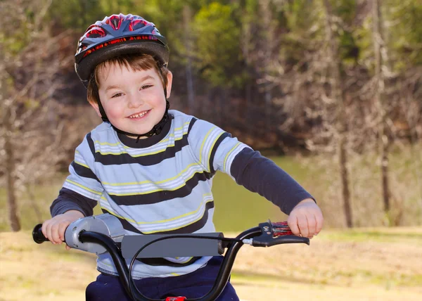 Boy riding bike — Stock Photo, Image