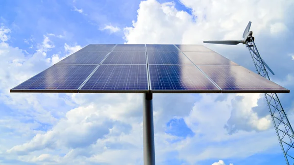 stock image Solar panel and wind turbine