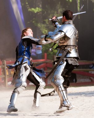 Sword fight at renaissance fair clipart
